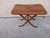A rare and elegant serving table. Designed to save space in the dining room or living room, it can be opened to...