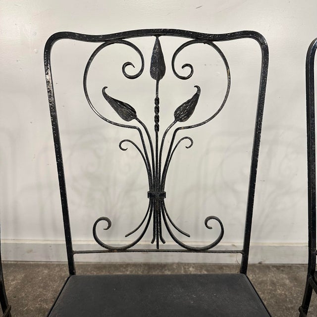 Set of 4 Salterini Iron Patio Dining Chair. This unique set of 4 dining chairs is painted black iron with a thin...