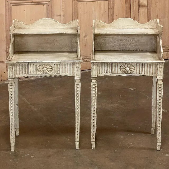Pair 19th Century Country French Louis XVI Painted Nightstands is a charming example of the combination of classical...