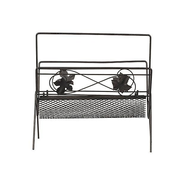 Black metal mesh and leaf-accented magazine rack, circa 1960s.