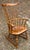 Classic New England style in this fan back Windsor rocking chair from Nichols & Stone of Gardner Mass. Carved crest, well...
