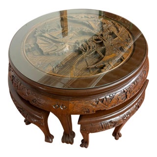 Vintage Carved Asian Hardwood Tea Table With Glass Top and Matching Nesting Stools For Sale