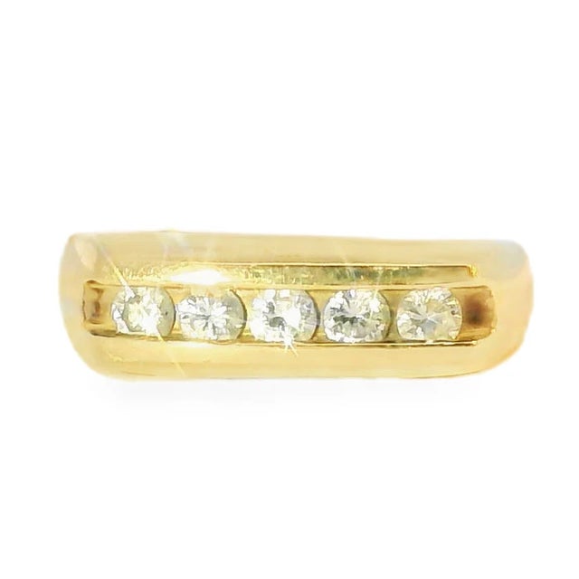 Elegant 14K yellow gold wedding band featuring 5 brilliant round diamonds 1 ct with G color, SI1 clarity. Classic design...