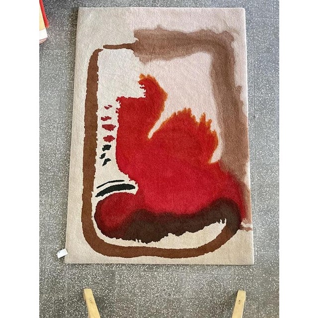 Elevate your interior with this striking vintage Tisca rug, a true masterpiece of 1980s hand-tufted craftsmanship....