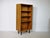 Minimalist walnut bookcase from Germany - 1960s. Four height-adjustable shelves in a straight frame on black legs. Width...