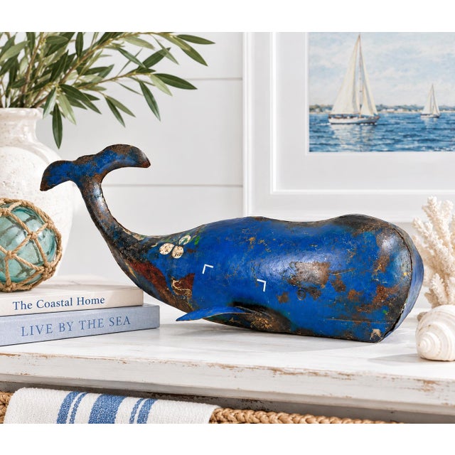 Handcrafted whale sculpture created from repurposed industrial steel drum panels. The dimensional form is hammered and...