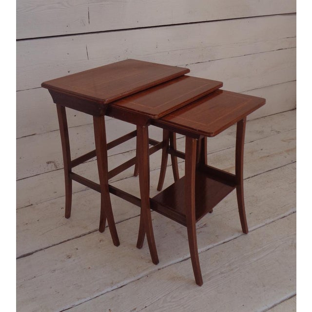 This beautiful set of Edwardian mahogany coffee tables have inlaid tops. They close like a nest to be opened when more...