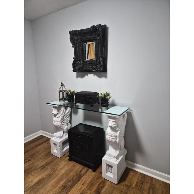 This gorgeous table was crafted in 1985 Atlanta, Georgia and is signed by House Parts Inc. The detailed sphinx pedestals...