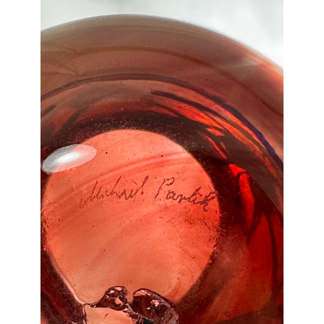 This art glass vase by Michael Pavlik showcases the artist's masterful use of color and form. Standing 5.25" high and 3.5"...