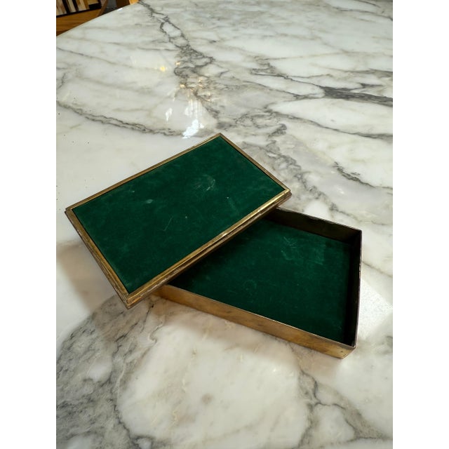 This rectangular vintage jewelry or trinket box features an elegant geometric inlay design crafted from green marble or...