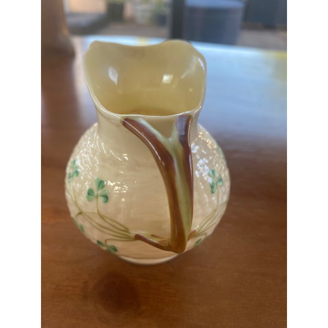 These are genuine Irish Belleek porcelain, in the Shamrock pattern, with the traditional basketweave texture and hand-...