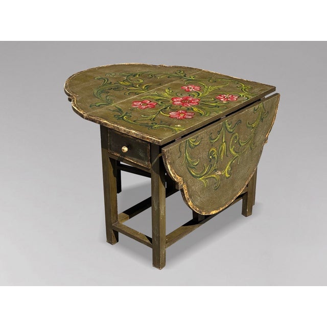 Charming early 20th-century painted italian drop-leaf table, circa 1920 a delightful tuscan painted drop-leaf table,...