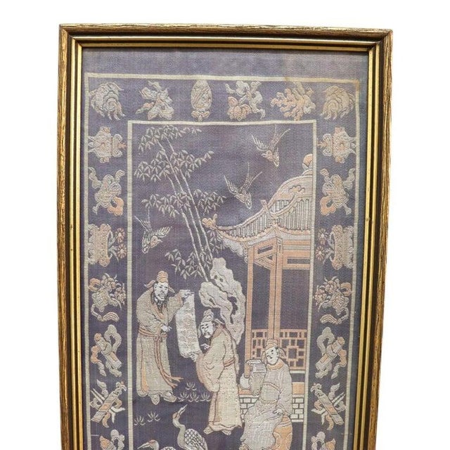 This intricately hand-embroidered silk panel from China, dating to the 20th century, depicts a lively genre scene. The...