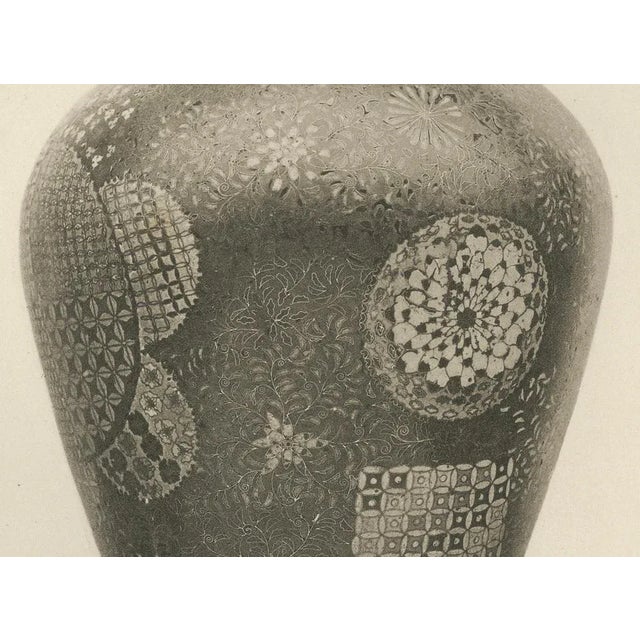 Title: pair of japanese decorative vases with intricate designs – plate viii from section vii : this black-and-white...