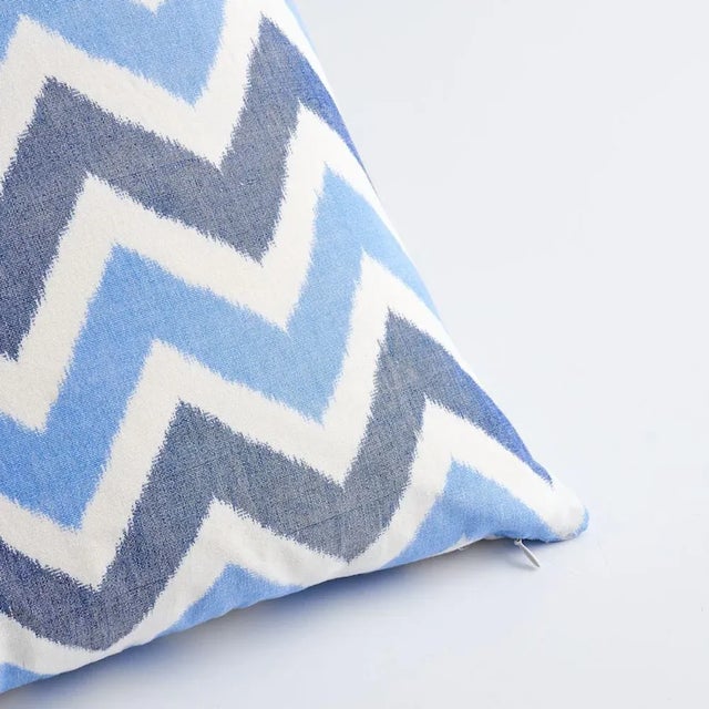 This pillow features Vedado Ikat with a knife edge finish. This happy ikat chevron stripe is a best-of-both-worlds...