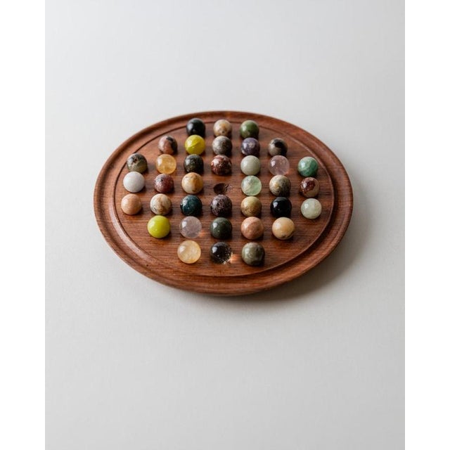 This vintage Solitaire board game from the 1960s is a charming example of classic Mid Century table games. The traditional...