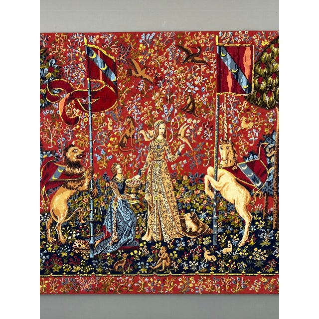 Large wall tapestry depicting "The Lady and the Unicorn," inspired by the famous series of medieval tapestries housed in...