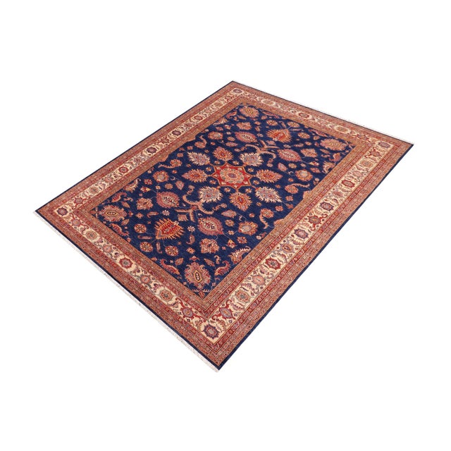 "Transform your home with this stunning hand-knotted Super Kazak rug, expertly crafted from premium hand-spun wool and...