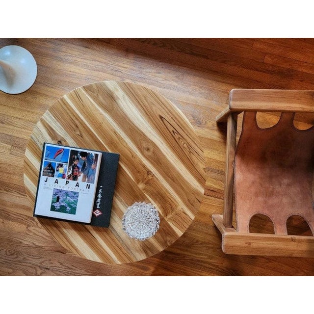 Designed by Magpiefoundthis Materials: leather, teak, hand made Overall width: 27.5 inches Overall height: 28 inches...