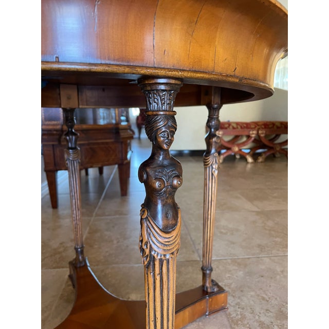 Pompeii side table by Alfonso Marina is a true work of art, crafted of fine woods in exquisite wood finishes by...