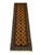This Mori Gul runner pairs a rich mustard-gold field with two orderly rows of small octagonal guls and repeating red...