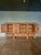 This Mid 1900s rustic French light oak paneled sideboard showcases the warmth and character of beautifully aged oak. The...