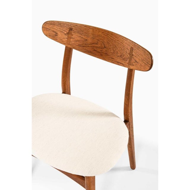 This set of nine dining chairs, model ch-30, designed by hans j. Wegner and produced by carl hansen & søn in denmark,...