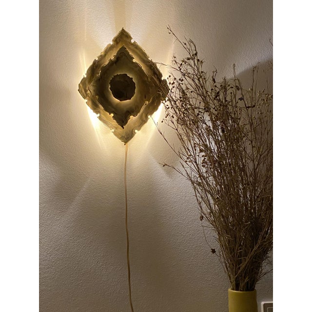 Raw, sculptural, and unmistakably handmade — this Brutalist wall light captures the drama of Svend Aage Holm-Sørensen's...