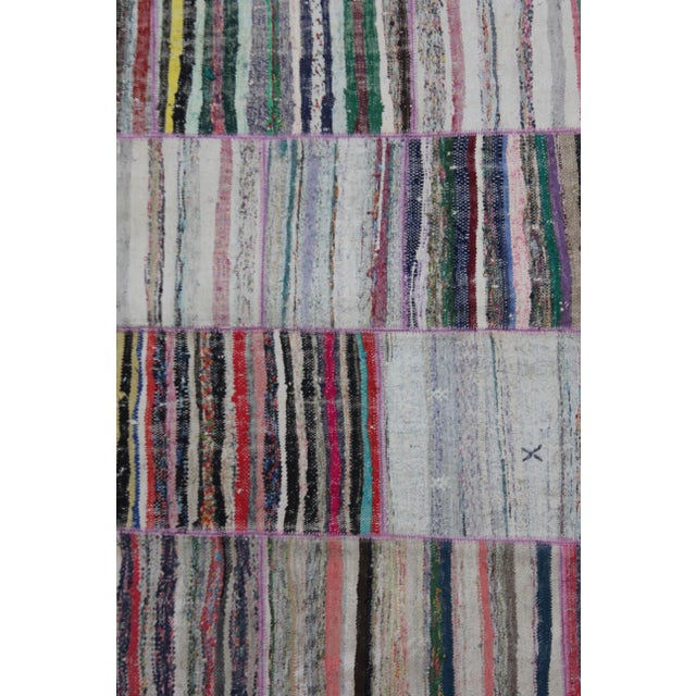 A beautiful antique Patchwork rug. It's in very good condition, practically new. This Patchworks rug is produced of older...