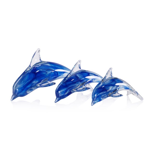 A stunning tribute to marine life, the Marinella Decorative Glass Dolphin captures movement and grace in hand-blown glass....