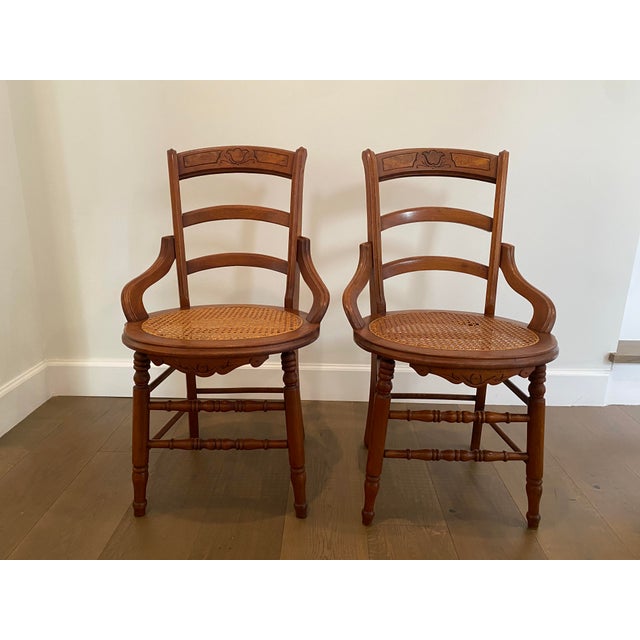 A stunning, structurally solid matching pair of antique solid wood chairs dating from the late Victorian to early...