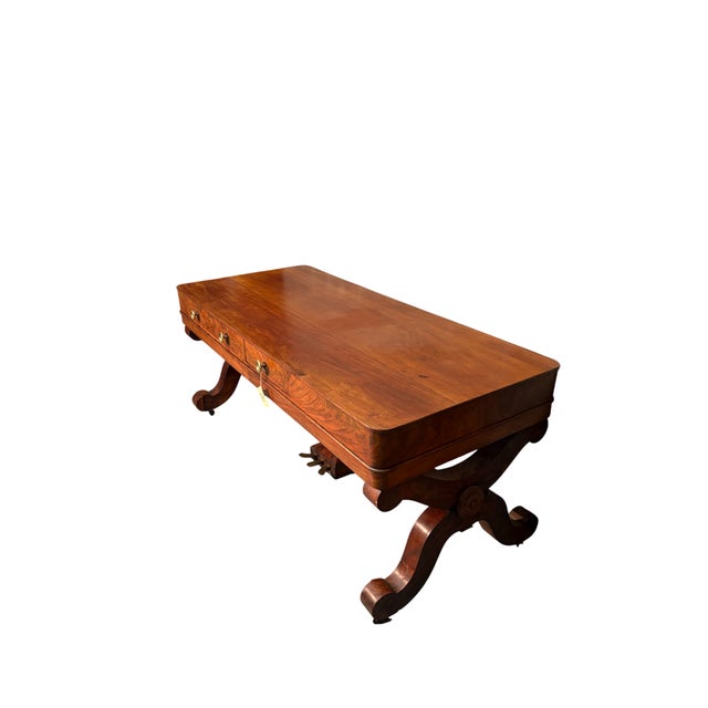 An original mahogany desk with three drawers, crafted from a former piano. It retains its characteristic column with three...