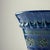 Mid-Century round Italian pottery vase with Bitossi Rimini Blue pattern. The outside surface of the vase is decorated with...