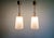 Pair of Mid Century pendant lights in brass with transparent crackled glass, 1950s-60s. Each of the pendant lights has...