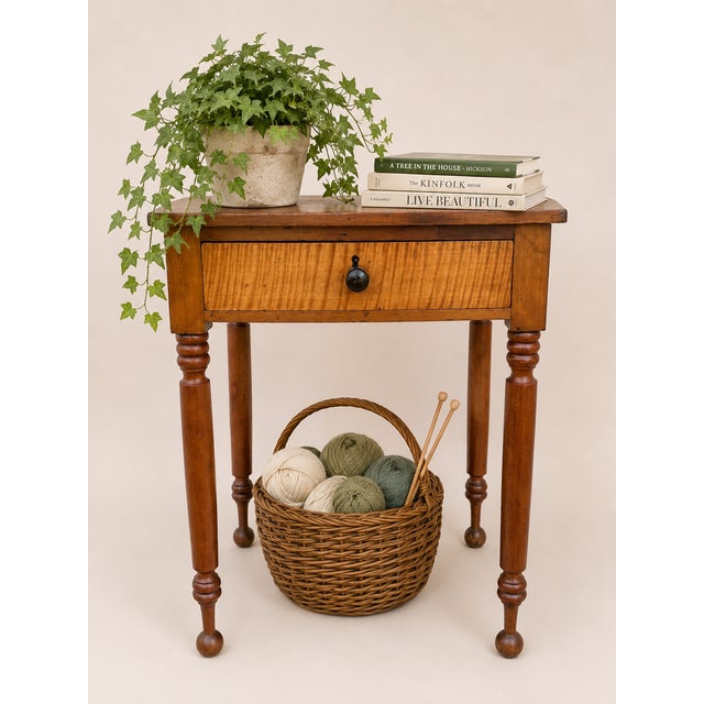 Antique Sheraton-style table. Hand crafted cherry table with hand turned legs. Beautiful curly tiger maple on the single...