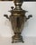 A substantial and highly decorative antique Russian samovar produced by the esteemed V.S. Batashev Steam Samovar Factory...