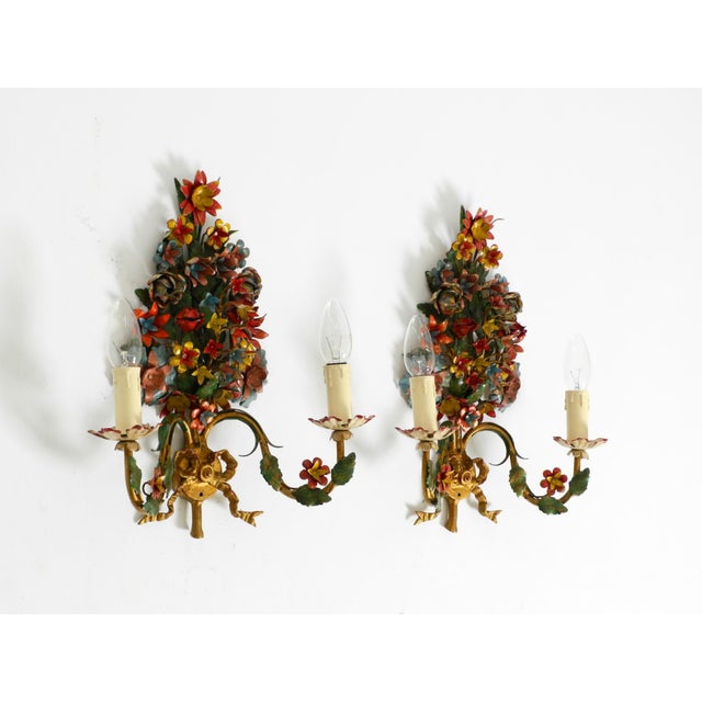 Two beautiful 1960s hand-painted and gold-plated metal wall lamps. designed and manufactured by hans möller. Made in...