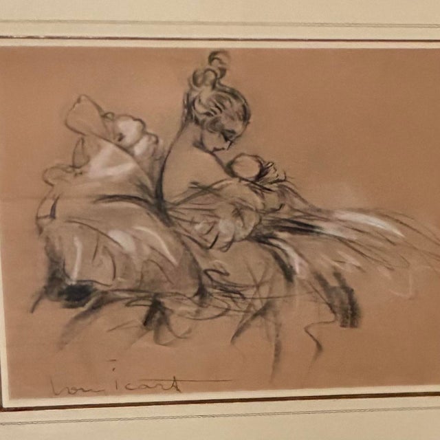 This signed Mother and Child lithograph reproduction with charcoal detail, represents the style and essence of Louis Icart...