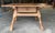 19th-century Swedish oak table with drawer and scrolled apron.