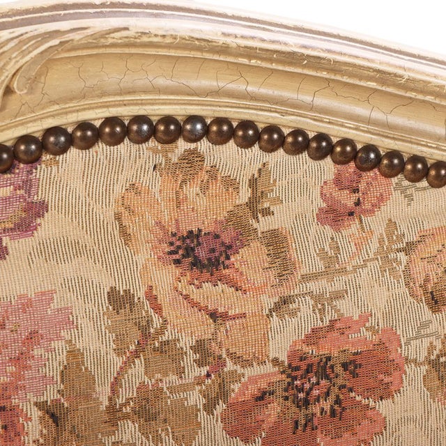 The full size frame having typically shaped headboard with carved crest, a curved footboard with carved crest and apron,...