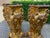 A dramatic pair of 1980 Italian Baroque-style pedestals, crafted in high-quality resin with an antique gold finish and...