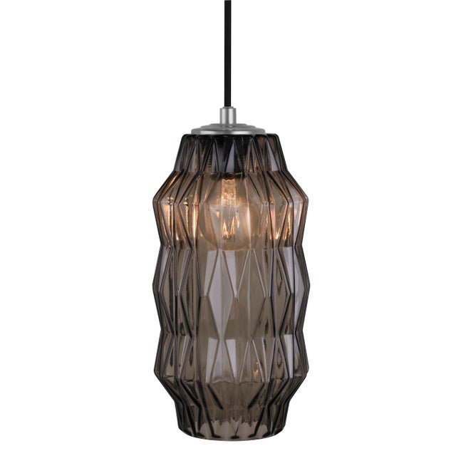 Hand-blown by master glassmakers in Venice, Italy, the Mimo Faceted Pendant Light by Oggetti features a jewel-like...