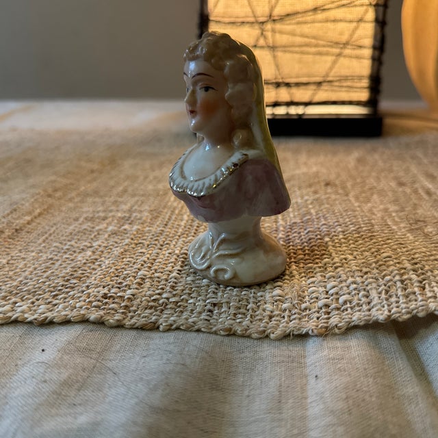 Whether you're decorating a study, living room, or adding to your collection of historical figurines, this Small Colonial...