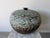 A beautifully crafted large vintage studio pottery bud vase featuring a striking organic form and richly textured glaze....