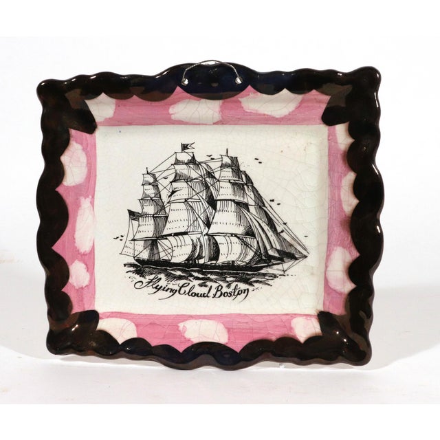 A Pink Lustre Maritime Plaque, “Flying Cloud Boston” Sunderland type, twentieth century Of rectangular form, transfer-...