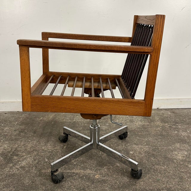 This is a rare 1971 Arden Riddle studio made office chair. The frame of the chair is made from oak, which is rarely used...