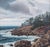Beautiful 1930's California seascape of the rocky Monterey coast, with numerous smooth stones on the water's edge depicted...