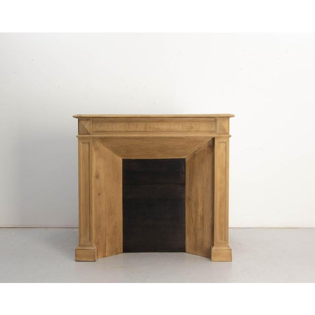 Molded oak fireplace mantel, circa 1890 an oak fire place mantel dating from the late 19th century, circa 1890, featuring...