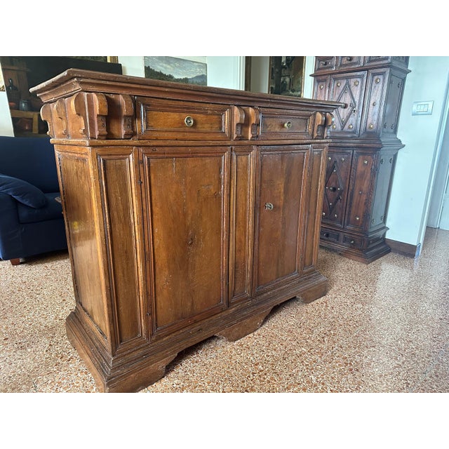 Walnut sideboard from the Emilian area, 17th-early 18th century. Beautiful proportions, not too tall and not very deep. A...