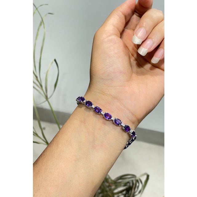 Elevate your jewelry collection with this exquisite Hallmarked 925 Sterling Silver Amethyst Tennis Bracelet, featuring an...